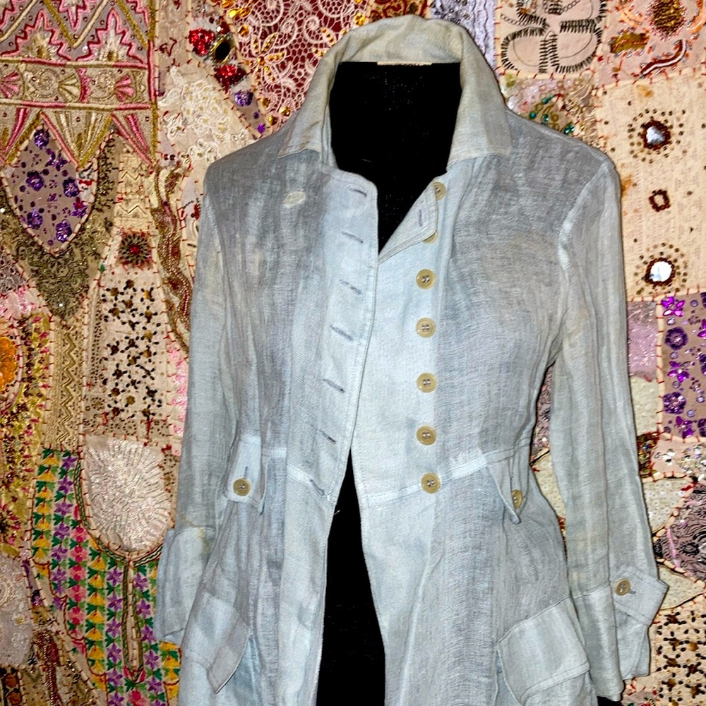 100% linen created in Italy, double breasted sheer & buttoned tailored sleeves